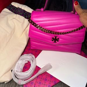 Brand New In the orignal packaginb with dust bag. Hot Pink Tory Burch